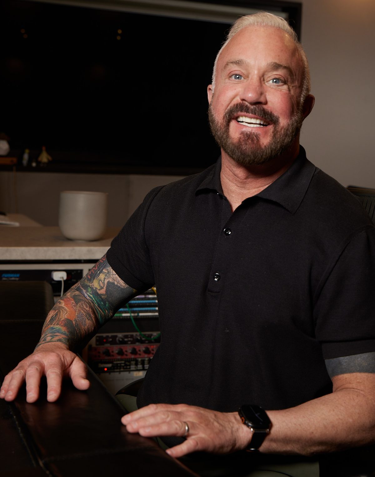 John Feldmann at the console in his studio